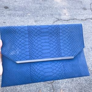 Bcbg royal blue snake print clutch